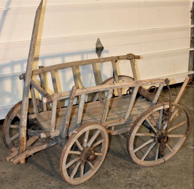 Country Wagon: Country wagon with 4 wheel in as found condition. Some parts on back are missing. 44" wide, 24" tall, 26" deep.
