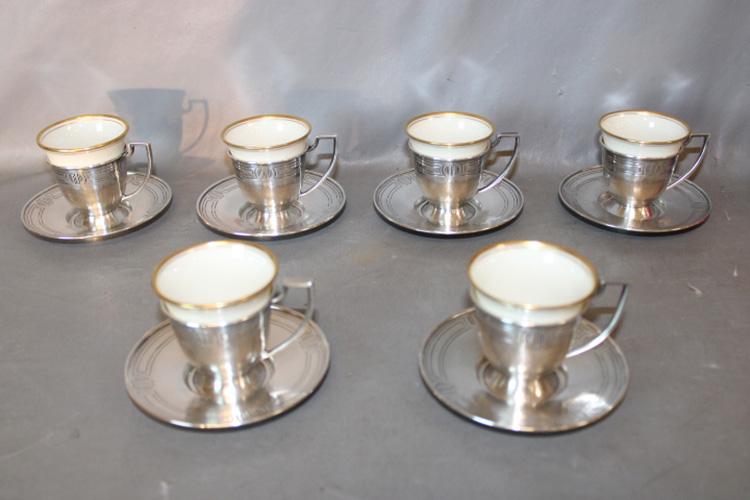 Set of 6 Sterling Demitasse Cups and Saucers with Lenox: Set of 6 sterling Demitasse cups and saucers with Lenox liners in beautiful condition. Silver weight 18 troy ox, no monogram.
