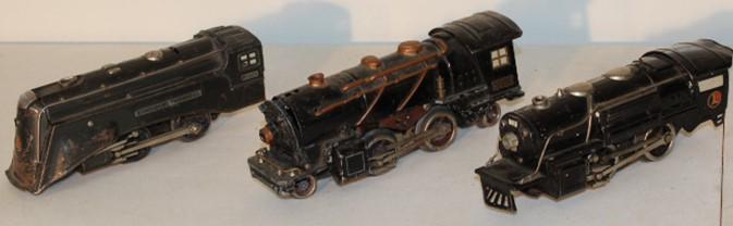 3 Lionel Engines: 3 Lionel engines. #265-E, 261, 259-E. They have wear.