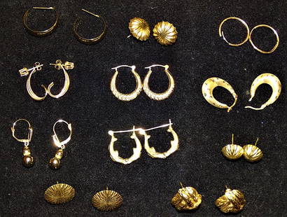 11 Set of 14k Gold Earrings: 11 set of 14k gold earrings, (2) with diamonds. 9.3 DWT.