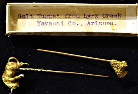 2 Gold Hat Pins (1) 18k with Detailed Bull, (1) 22k: 2 gold hat pins from the Lynx Creek Yavapai Co., Arizona. (1) 18k with detailed bull, and (1) 22k gold nugget.