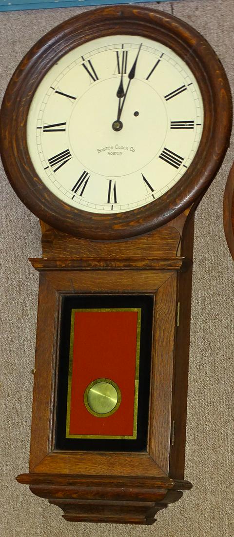 Oak Weight Driven Regulator by Boston Clock Co.: Oak weight driven regulator by Boston Clock Co. Been refinished, possibly has a new face. 16" wide, 33" tall, 5" deep.