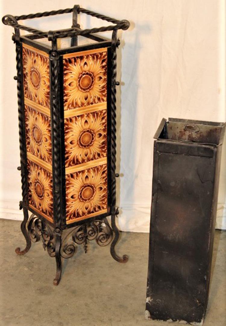 Great Wrought Iron and Tile Umbrella Stand: Great wrought iron and tile umbrella stand with liner tiles marked "J. & J. G. Low Art Tile Works, Chelsea Mass. 1881". 10" wide, 28" tall.