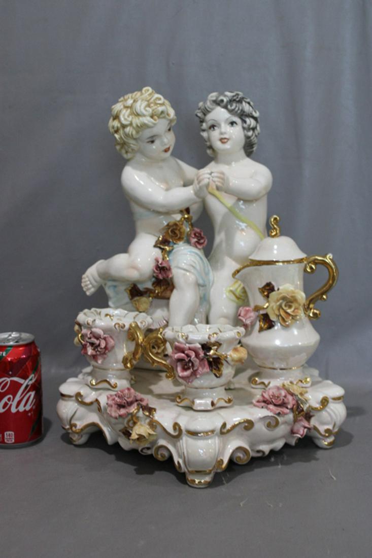 Large Benrose Capodimonte Center Piece: Large Benrose Capodimonte center piece. Looks to be all good, might have a rub that I didnâ€™t see. 13" wide, 16" tall, 12" deep.