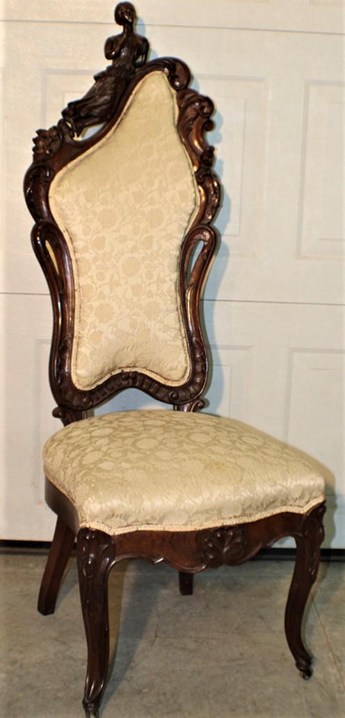 Rare Heavily Carved Rosewood Slipper Chair with a: Rare heavily carved rosewood slipper chair with a reclining woman in real nice condition. 18" wide, 50" tall, 26" deep.