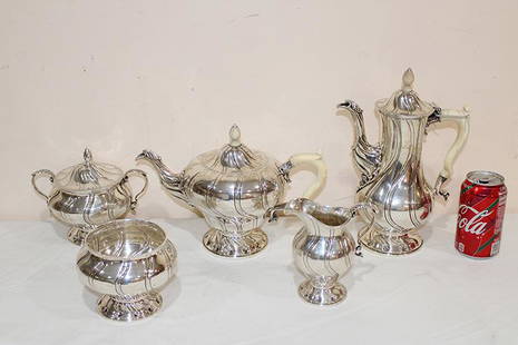 5 Piece Norman of London, 5 Piece Sterling Tea and: 5 piece Norman of London, 5 piece sterling tea and coffee set with a silver plate tray. Has bone handles and weight. 98 troy oz with the handles. No monograms. Awesome set.