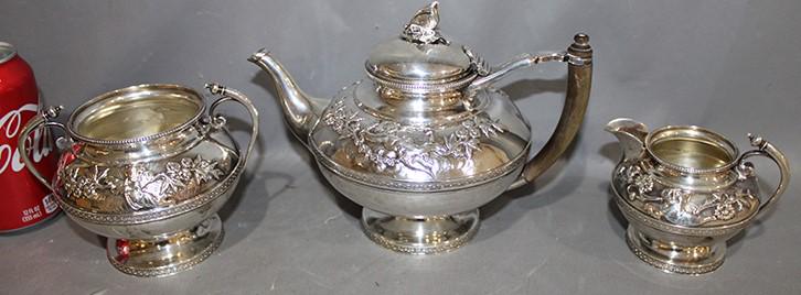 Fabulous Sterling Silver 3 Piece Tea Set with: Fabulous sterling silver 3 piece tea set with butterflies and cupids. Hall marked, no monograms. 33 troy oz including handles. Great set.