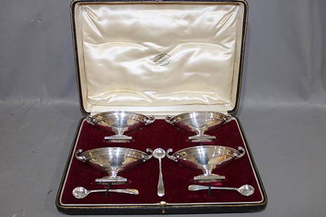 Exceptional 4 Huge Sterling Silver Master Salts and 3: Exceptional 4 huge sterling silver master salts and 3 spoons. All hall marked by Goldsmith & Co. London in the original box. 14 troy oz.