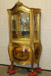 Oversize 19th C. Vernis Martin Gold Gilt Curio with: Oversize 19th C. Vernis Martin gold gilt curio with hand painted scenic panels. Has a lift up secret compartment in the base. 40" wide, 76" tall, 18" deep.