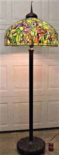 Large Heavy Tiffany Style Floor Lamp with Awesome 27": Large heavy Tiffany style floor lamp with awesome 27" leaded shade in real nice condition. Extremely heavy bronze base. 27" wide, 79" tall.