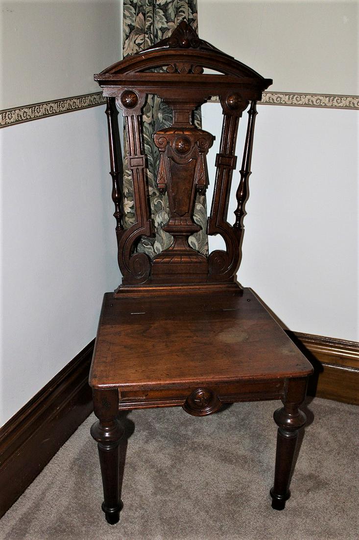 Walnut Renaissance Chair with Lift Seat and Burled Back: Walnut Renaissance chair with lift seat and burled back with drape. 20" wide, 47" tall, 20" deep.