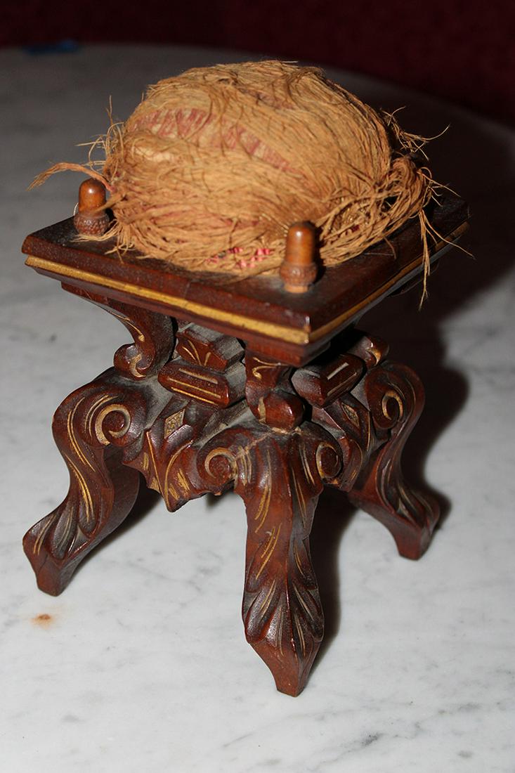 Wonderful Renaissance Walnut Pin Cushion with Elaborate: Wonderful Renaissance walnut pin cushion with elaborate legs and gold incising. The original pin cushion on top (tatter cushion). 5" wide, 8" tall, 5" deep.