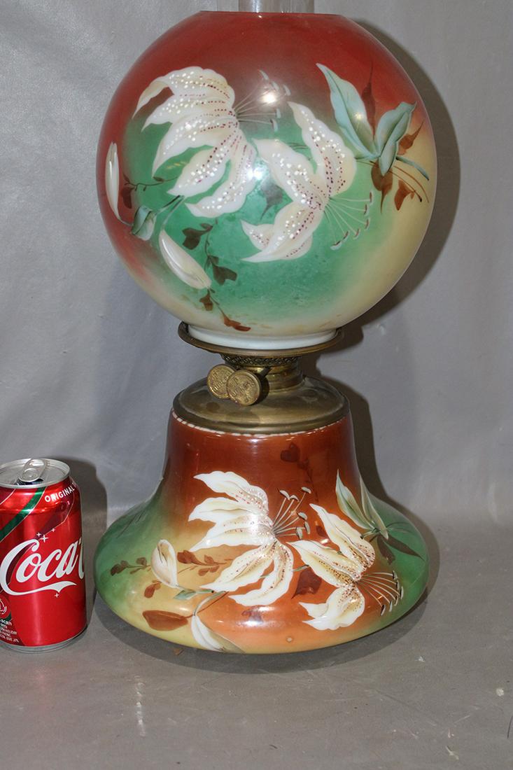 All Original Antique Gone With The Wind Lamp With Floral Motif: All original antique Gone with the Wind lamp with floral motif and raised enameling on the flowers. Perfect, never electrified. 8" wide, 19" tall.
