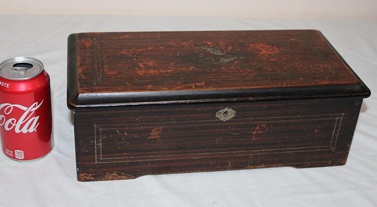 Small 14" Cylinder Music Box: Small 14" cylinder music box. Plays well, case has wear. Should be refinished, teeth are good. 14" wide, 5" tall, 7" deep.