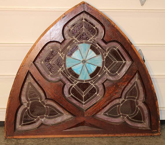Fancy Multicolored Leaded Window: Fancy multicolored leaded window with a gothic motif. Couple of little lines. 47" wide, 41" tall.