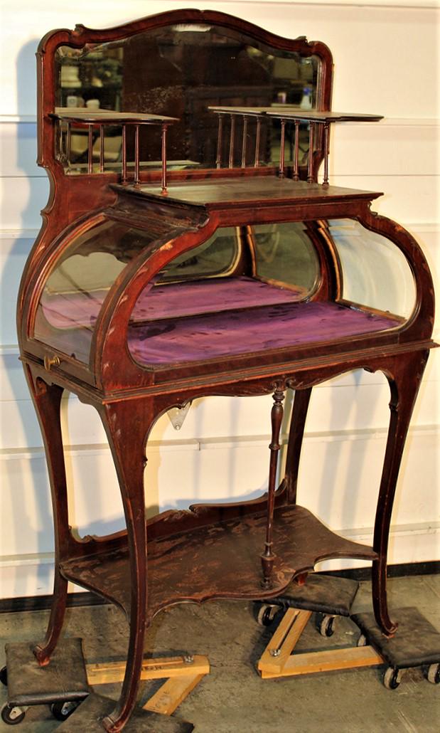 Unusual Victorian Curio Etagere: Unusual Victorian curio etagere with 2 bowed side doors. 1 spindle and a couple of small molding missing, finish needs sprucing up 33" wide, 55" tall, 15" deep.