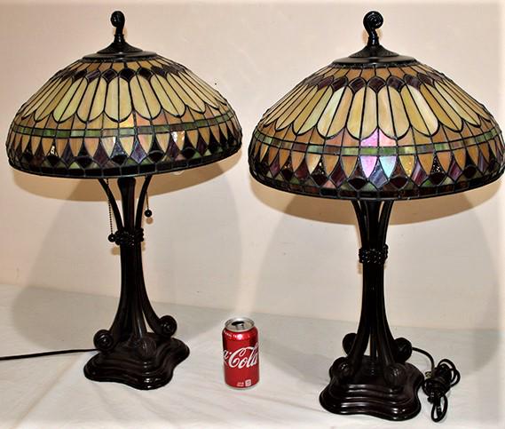 Pair Of Quality Signed "Quoizel" Leaded Lamps: Pair of quality signed "Quoizel" leaded lamps in nice condition. Several colors. 16" wide, 26" tall.