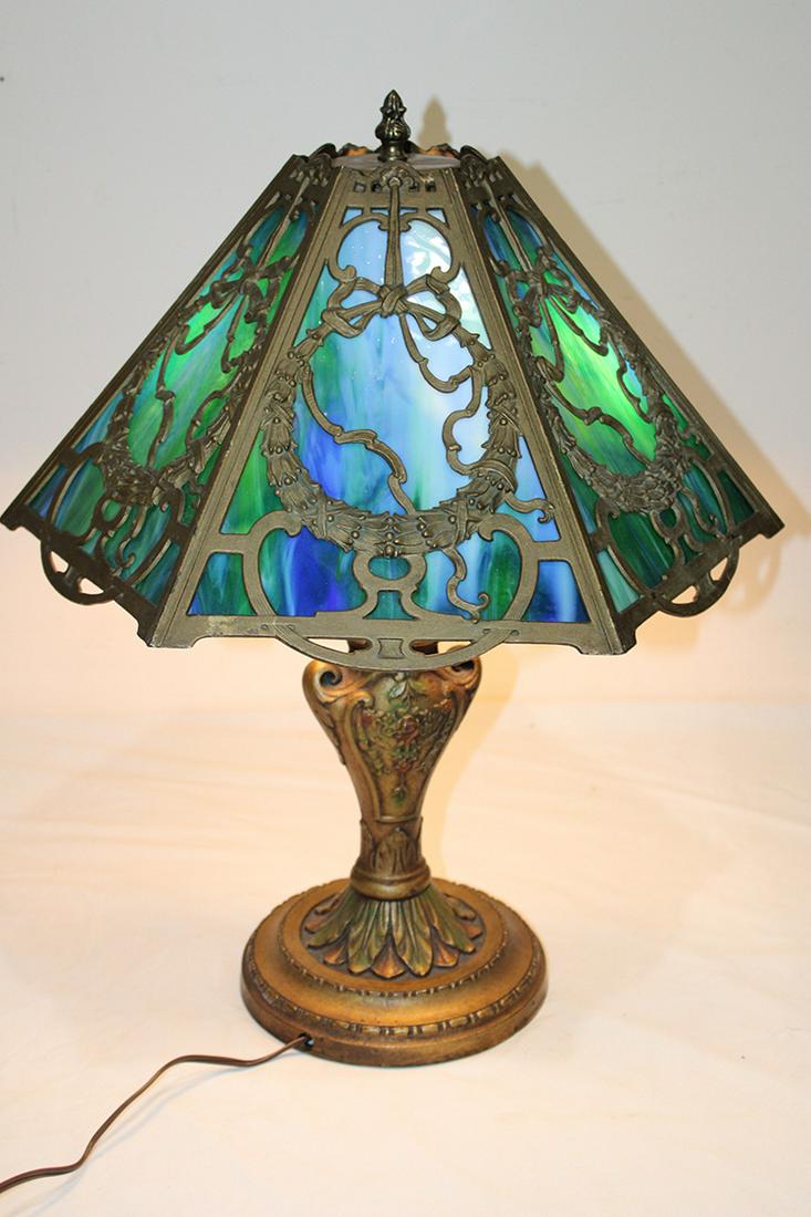 Very Pretty Blue With Green Panel Lamp: Very pretty blue with green panel lamp with wreath design, all glass is good. 16" wide, 22" tall.