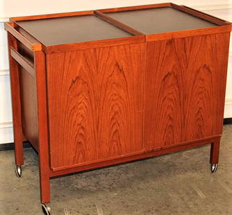 Nice Mid Century Bar In Teak: Nice mid century bar in teak by Niels Erik Glasdam Jensen all in nice condition. Minor wear, consistent with age. 35" wide, 29" tall, 20" deep.