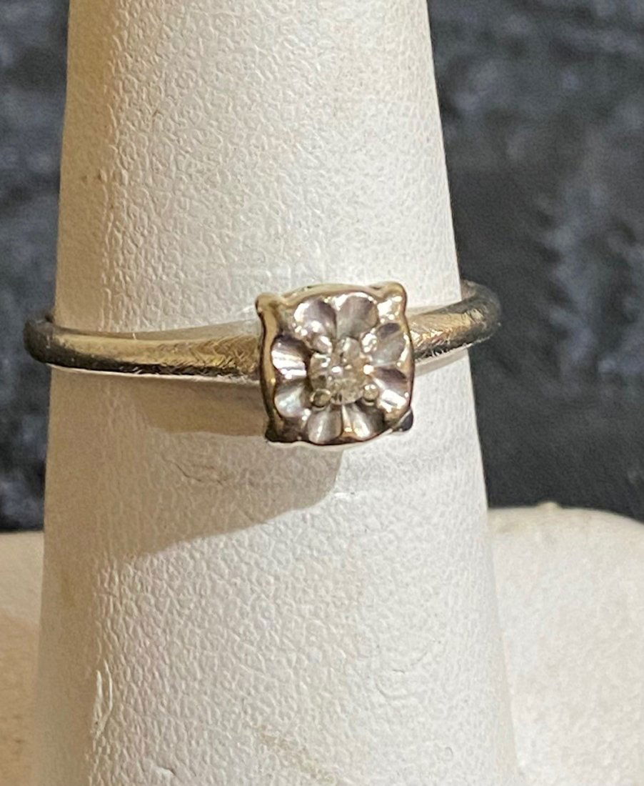 Small Diamond Ring In A 14 Carat Gold Setting (1 of 3)