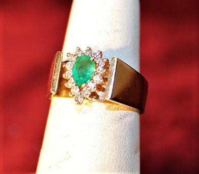 14k shouldered style ring with a pear shaped emerald and 14 diamonds (1 of 4)