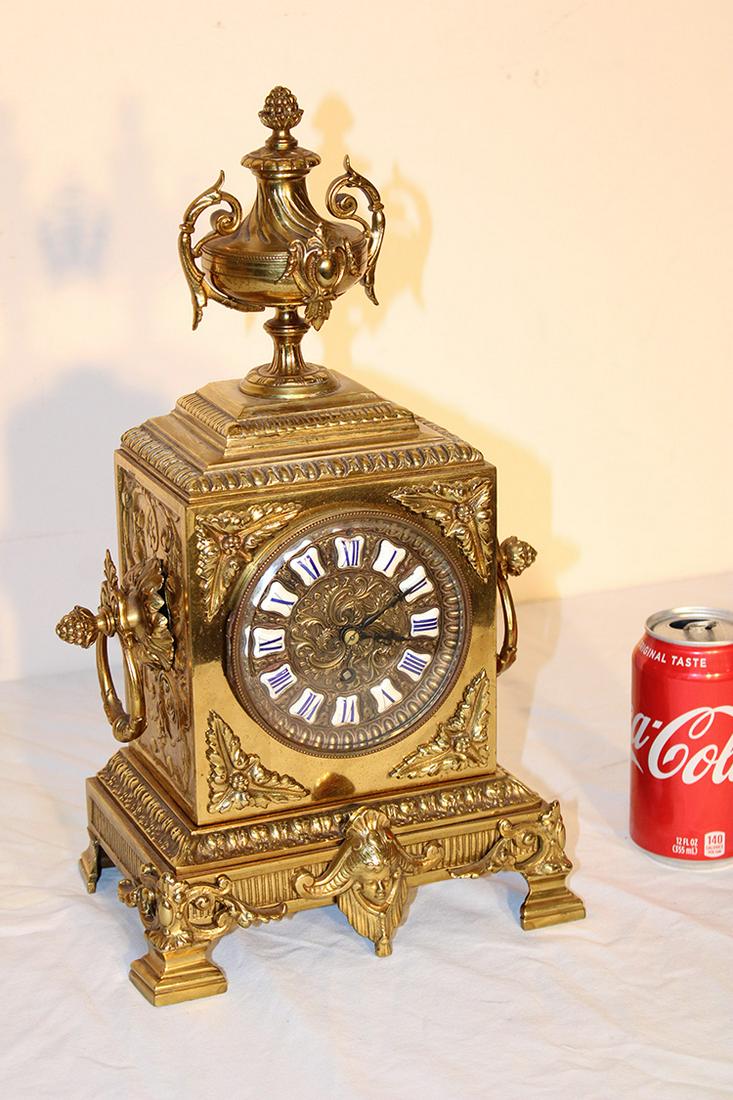 Sweet brass mantel clock with ladies head and porcelain numerals urn crest (1 of 6)