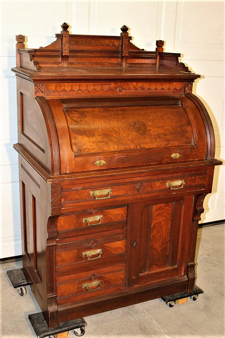 Clean walnut cylinder roll desk with burled trim and carved gallery (1 of 4)