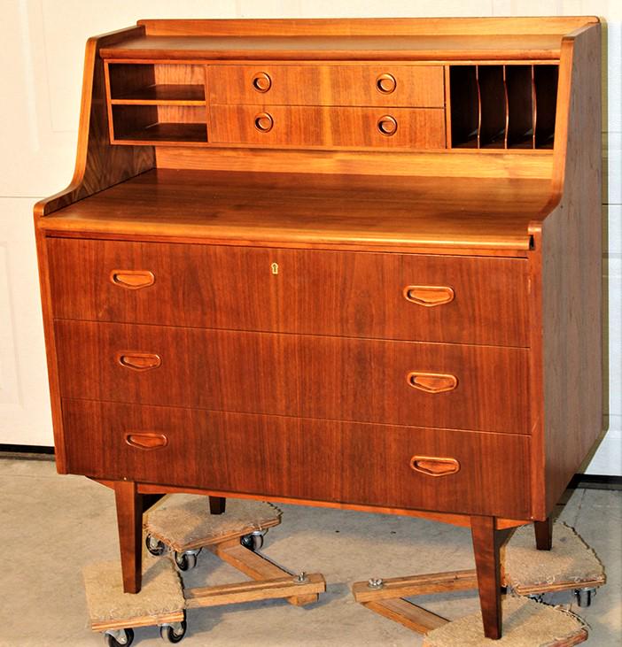 Clean mid century teakwood desk with pull out writing surface: Clean mid century teakwood desk with pull out writing surface. Marked Crowley all in nice estate fresh condition. 35" wide, 39" tall, 19" deep.