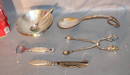6 Pieces Of Signed Georg Jensen Sterling Silver: 6 pieces of signed Georg Jensen sterling silver including fancy tongs, spoon, bottle opener, etc. All nice, no monograms.