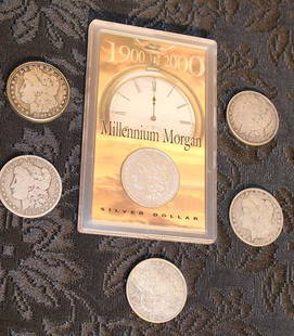 6 Morgan Silver Dollars: 6 Morgan silver dollars including 1 Millennium Morgan estate.