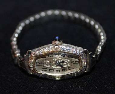 Warwick 18K Gold Ladies Diamond Wrist Watch: Warwick 18k gold ladies diamond wrist watch. 17 jewels, working. Says Jax Watch Co. on the movement.