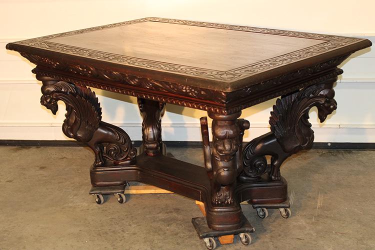 Large Heavily Carved Library Table With Full Bodied Wing Griffin Supports (1 of 5)