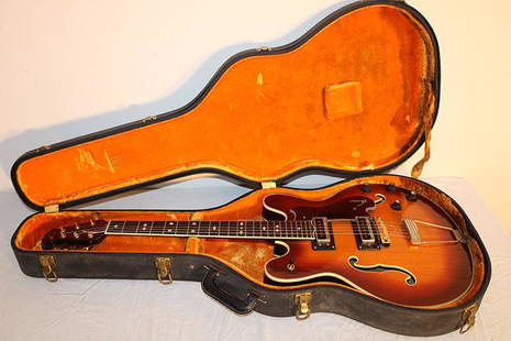 Deluxe Ovation Vintage "Thunderhead" Electric Guitar Model #A932: Deluxe ovation vintage "Thunderhead" electric guitar in the original case model #A932. Wood is all good, has some crackling on the finish. Probably 60's or 70's.