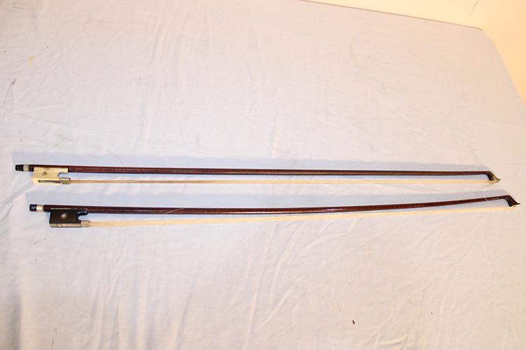 2 Vintage Violin Bows. (1) Marked X, (1) Marked XXXV: 2 vintage violin bows. (1) marked X, (1) marked XXXV with a bone frog. Appr. 29" long.