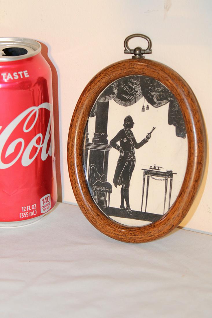 Antique Hand Done Miniature Silhouette: Antique hand done miniature silhouette in an oval frame, very intricately done. All in condition. 4" wide, 5" tall.