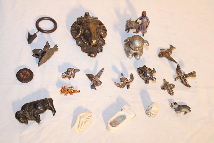 Group Of Neat Miniature Animals And Other Miniatures: Group of neat miniature animals and other miniatures including Bucki ribbons and dog, ram belt buckle. All estate fresh. Buffalo has a chip foot.
