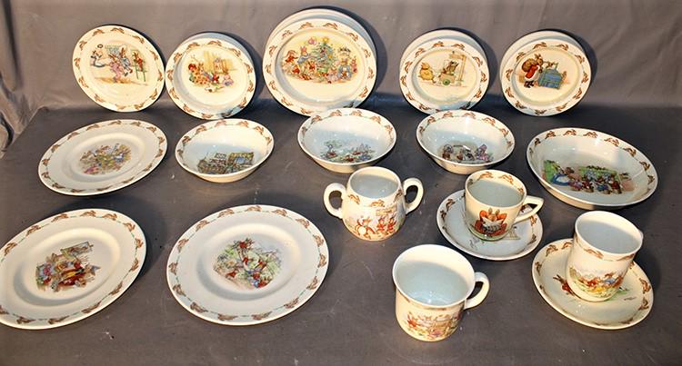 18 Pieces Of Signed Royal Doulton Bunny Kins: 18 pieces of signed Royal Doulton Bunny Kins. 1 bowl has a small flick (see photo) otherwise all good. Some marked Barbara Vernon.