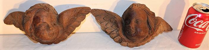 Pair Of 2 Hanging Carved Winged Cupids: Pair of 2 hanging carved winged cupids. No finish on them. 10" wide, 5" tall, 3" deep.