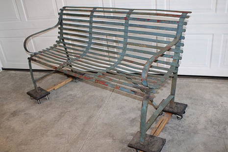 Heavy Iron New York City Bench: Heavy iron New York City bench with strapped seat and back. Old paint, estate fresh. 60" wide, 32" tall, 24" deep.
