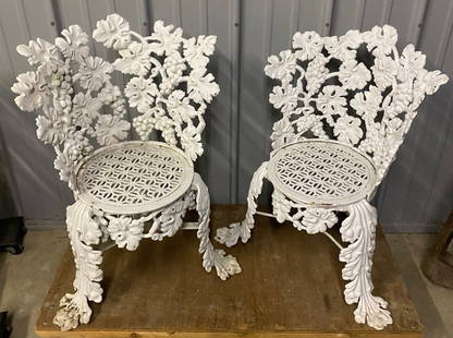 Pair Of Antique Cast Iron "Grape Vine" Chairs: Pair of antique cast iron "grape vine" chairs in nice condition. 28" wide, 31" tall, 16" deep.