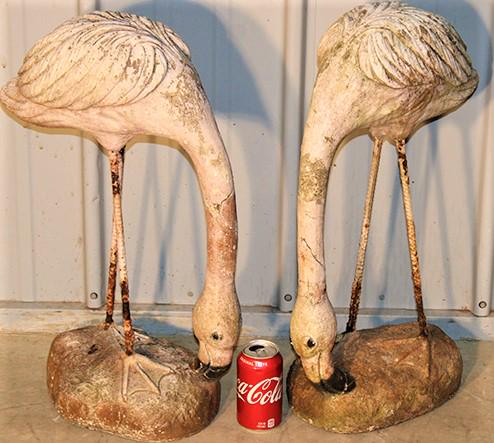 Pair Of Antique Concrete And Iron Garden Flamingos: Pair of antique concrete and iron garden flamingos, solid and sturdy. Has some age, cracking on the neck (see photo). 7" wide, 25" tall, 15" deep.