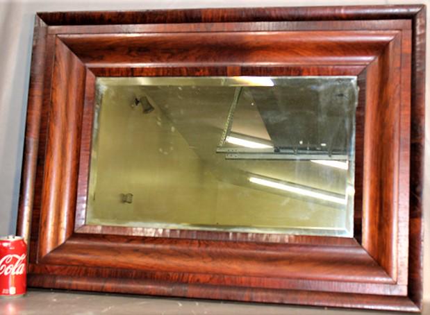 Period 19Th C. Rosewood Og Mirror With Beveled Glass: Period 19th C. rosewood OG mirror with beveled glass. Couple of small imperfections but real nice for its age. 34" wide, 25" tall.