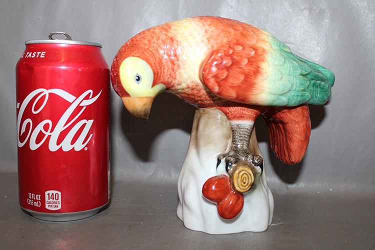 China Parrot Signed "Herend" Hungary: China parrot signed "Herend" Hungary in good condition. 150 yr. anniversary. 6" wide, 6" tall, 3" deep.