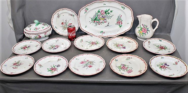 14 Pcs Of Luneville China France: 14 pcs of Luneville China France including 18" platter with dragonfly. 1 plate has a spider and a couple have slight discoloration.