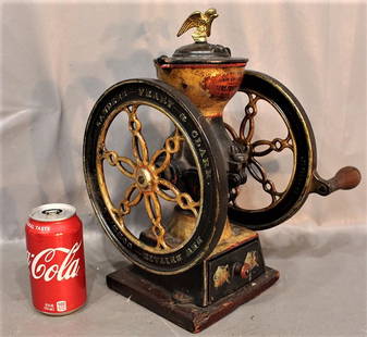 Sweet Landers, Frary And Clark Small Coffee Grinder: Sweet Landers, Frary and Clark small coffee grinder with original stenciling. Works perfectly, has the original iron drawer. 8 1/2" wheel. 11" wide, 14" tall, 9" deep.