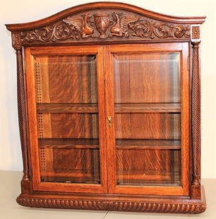 Super Oak Horner Hanging Cupboard With Winged Griffins: Super oak Horner hanging cupboard with winged griffins. Has the beveled glass all around. 35" wide, 37" tall, 10" deep.