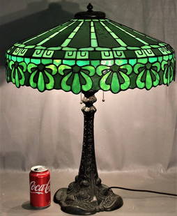 One Of The Prettiest 20" Duffner And Kimberly Greek Key Leaded Table Lamp: One of the prettiest 20" Duffner and Kimberly Greek key leaded table lamp. Fabulous 3 socket base, 2 tone green. Nice lit up, there is 1 small section with line in the glass (see photo). 20" wide,