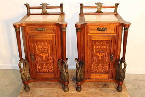 Pair Of Marble Top Continental Half Commodes With Full Bronze Swan Supports: Pair of marble top continental half commodes with full bronze swan supports. Marquetry inlaid doors with birds and duck head gallery (very different). 21" wide, 37" tall, 16" deep.