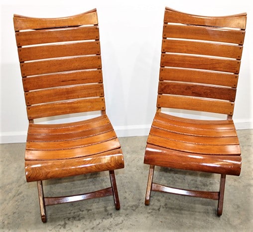 Pair Of Nice 1990'S French Rosewood Folding Chairs By Triconfort: Pair of nice 1990's French rosewood folding chairs by Triconfort in nice condition. Estate fresh, very heavy. 16" wide, 36" tall, 26" deep.