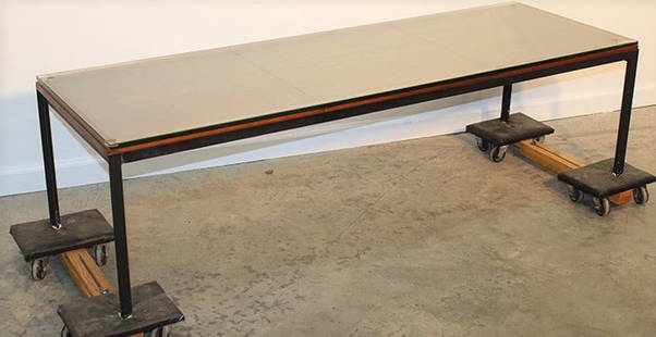 Rare Florence Knoll And Angle Coffee Table With 3 Panel Walnut Top: Rare Florence Knoll and Angle coffee table with 3 panel walnut top in nice condition. Has a beveled glass. 60" wide, 16" tall, 20" deep.